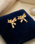 Polished Ribbon Bow Stud Earrings – 925 Sterling Silver