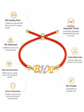 925 Sterling Silver Gold-Plated BHAI Charm Rakhi with red braided thread, product photo on white background