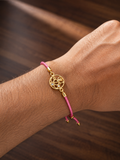 925 Sterling Silver Gold-Plated Ganesha Charm Rakhi with pink braided thread — alternate angle