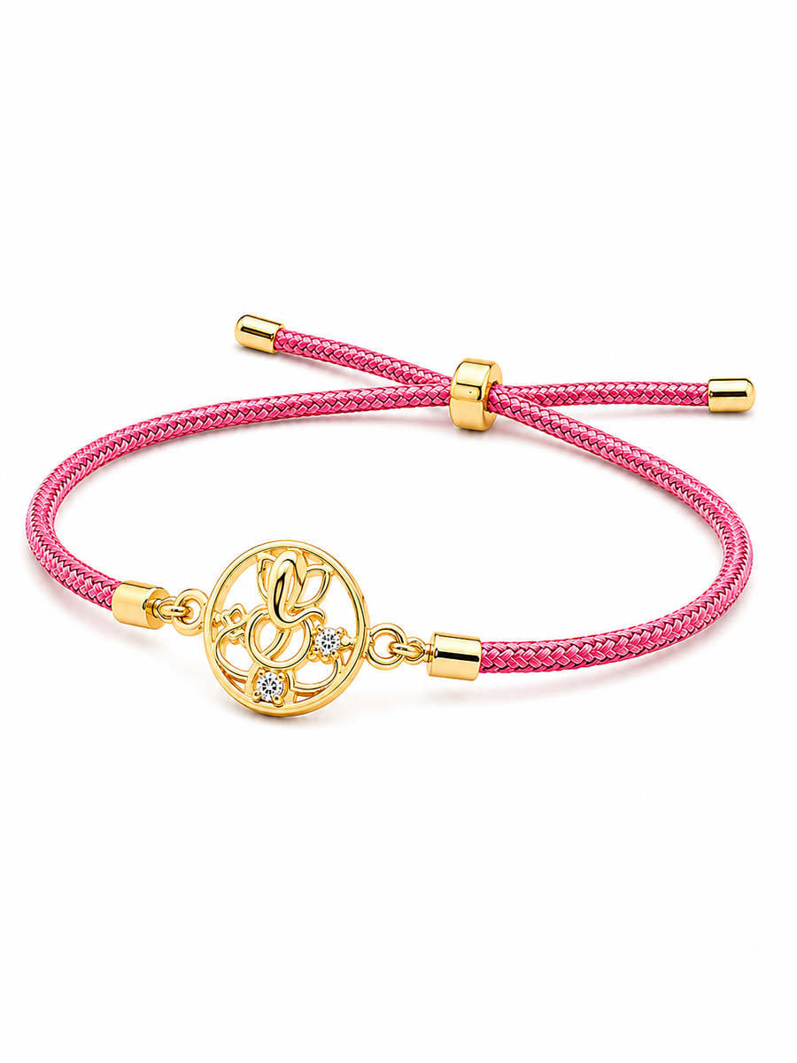 925 Sterling Silver Gold-Plated Ganesha Charm Rakhi — close-up of the CZ-studded Ganesha charm